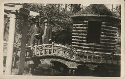 Two Men Standing on Small Bridge - House of David Park Postcard