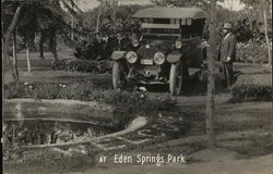 At Eden Springs Park - Man Next to Car Near "Welcome" Message Postcard