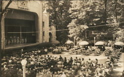 A Large Stage with Performers and an Audience Postcard