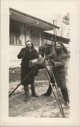 Two Men Behind Camera Postcard