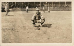 Catcher Crouching with Baseball Players in Background on Field Benton Harbor, MI Postcard Postcard Postcard