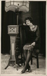 Woman Seated Near Ornate Lamp Benton Harbor, MI House of David Postcard Postcard Postcard