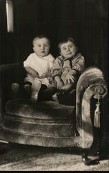 Two Babies Sitting on a Chair House of David Postcard Postcard Postcard