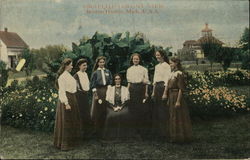 6 Women Standing Around a Woman Sitting in a Chair in a Garden Benton Harbor, MI House of David Postcard Postcard Postcard