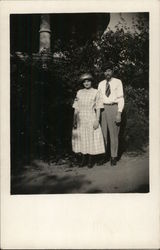 Man and Woman Standing Together Outdoors Near Foliage Benton Harbor, MI House of David Postcard Postcard Postcard