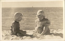 Two Young Children Playing in Sand Near Shoreline Postcard