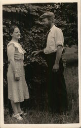 Man and Woman Outdoors Near Pine Tree Benton Harbor, MI House of David Postcard Postcard Postcard