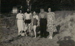 People with Child Standing on Sand, Some Wearing Swimsuits Postcard