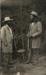 Two Men Wearing Hats and Long Suit Jackets Outdoors Postcard