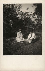 Man and Woman Sitting on Ground Outdoors - Manna Woodworth & Ann Benton Harbor, MI House of David Postcard Postcard Postcard