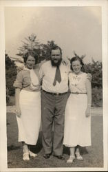 Man Standing Between Two Women Benton Harbor, MI House of David Postcard Postcard Postcard