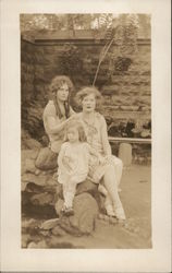 One Little Girl Seated on Rocks with Two Older Girls Benton Harbor, MI House of David Postcard Postcard Postcard