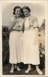 Two Women Standing in a Garden Postcard