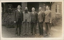 Five Men Standing in Front of a House Postcard