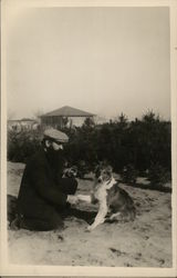 Man Holding Collie's Paw Outdoors House of David Postcard Postcard Postcard