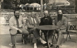 Men Seated at Table Benton Harbor, MI House of David Postcard Postcard Postcard