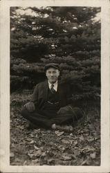 Boy Sitting Among Trees Benton Harbor, MI House of David Postcard Postcard Postcard