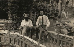 Two Men Seated on Small Bridge Near Eden Springs Pennants Benton Harbor, MI House of David Postcard Postcard Postcard