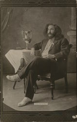 A Man Sitting Next to a Table House of David Postcard Postcard Postcard