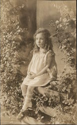 A Little Girl Sitting in a Garden House of David Postcard Postcard Postcard