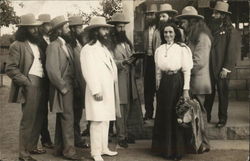 A Large Group of Men Standing Around a Woman House of David Postcard Postcard Postcard