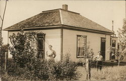 Woman and Boy Standing in Yard Near House Children Postcard Postcard Postcard