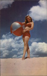 "Greetings" - Woman in Two-Piece Swimsuit Holding Beach Ball Postcard