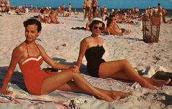 Sunbathers on the Beach - Two Women in Swimsuits Postcard