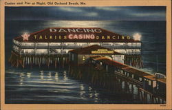 Casino and Pier at Night Postcard