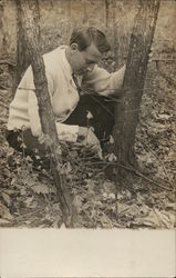 Man Kneeling By Tree Men Postcard Postcard Postcard