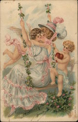 Woman on Swing Kissing one of Two Cherubs Postcard