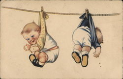 Two Babies Hanging From Clothesline Postcard Postcard Postcard