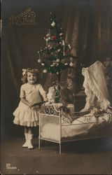 Pretty Girl with Doll in front of Christmas Tree Children Postcard Postcard