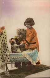 Art Deco Girls Playing with Doll Postcard