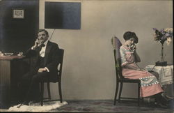 Man and Women on Telephones Postcard