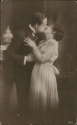 Couple Embracing in a Kiss Couples Postcard Postcard