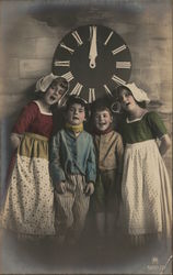 Dutch Children Standing Under Clock Postcard