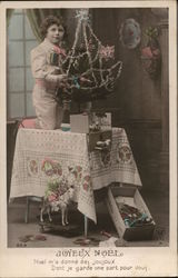 Boy Decorating Christmas Tree Postcard