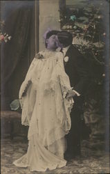 Couple Dressed for Marriage and Kissing Postcard