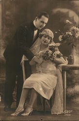 Man Giving Woman Flowers Postcard