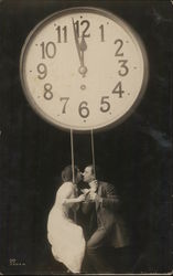 A Man and a Woman Kissing under a Clock Postcard