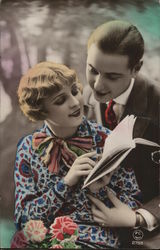 Art Deco Couple Close Together Looking at a Book Postcard