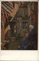 Woman Seated Outdoors Near Houses Doing Needle work Postcard