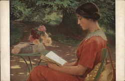 Woman in Orange Dress Seated Outdoors Reading a Book Postcard