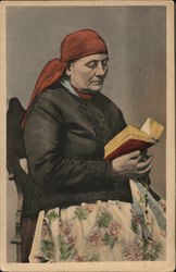 Older Woman Wearing Red Scarf Reading Book Holding Rosary Postcard