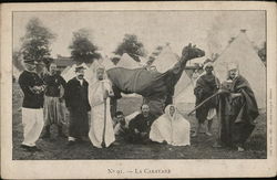 Group of Men Standing Near Camel Wearing Wrap Circus Postcard Postcard