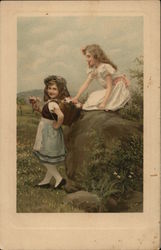 Two Young Girls Playing in Field with Basket of Flowers Children Postcard Postcard