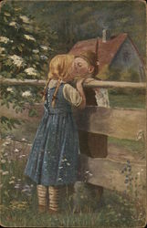 Boy and Girl Kissing Over Fence Top Postcard