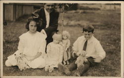 Children with Dolls, Teddy Bear and Kitten Postcard