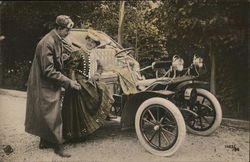 Woman Being Handed Into Car Postcard